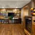 Best Western Northwoods Lodge in Siren lobby retail area with wooden floors, TV, shelves and mini fridge