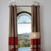 Monte Dos Apóstolos in Portalegre: desk and chair by arched window with hillside and pool view