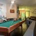 B&B Wasi Airport Lima in Lima lounge with pool table, seating area, and wall decor