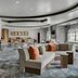 SpringHill Suites by Marriott Jacksonville North I-95 Area lobby with seating and bar area in Jacksonville