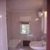 Casa Siciliana Altarbiah in Trabia bathroom with bathtub, pedestal sink and window view