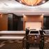 Apa Hotel Nagoya Marunouchi Ekimae lobby with self-check-in kiosks and modern ceiling lighting in Nagoya