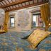 Residence Porta Antica Centro Storico room in Rovinj with stone walls, wood beams and twin windows
