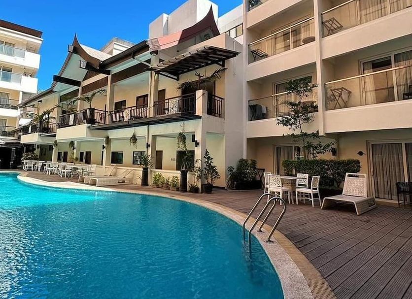 Boracay Haven Resort in Boracay with a curved outdoor pool and balcony views
