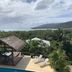 Island Views, Airlie Beach: tropical terrace with loungers and shaded gazebo overlooking the bay