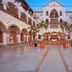 Hacienda del Mar Los Cabos, An Autograph Collection Resort courtyard with arches and palm trees in Cabo San Lucas