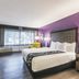 La Quinta Inn & Suites by Wyndham Virginia Beach room with king bed and large window