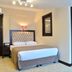 Golden Siyav Hotel in Istanbul guest room with double bed, wall mirror and en suite bathroom doorway