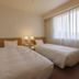 Shimonoseki Station West Washington Hotel Plaza in Shimonoseki, twin guest room with two beds and window