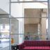 Ramada Hotel & Suites by Wyndham Sydney Cabramatta lobby with magenta sofa and floor-to-ceiling windows