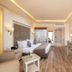 Charmillion Club Resort in Sharm el-Sheikh guest room with king bed, desk, TV and bathroom view