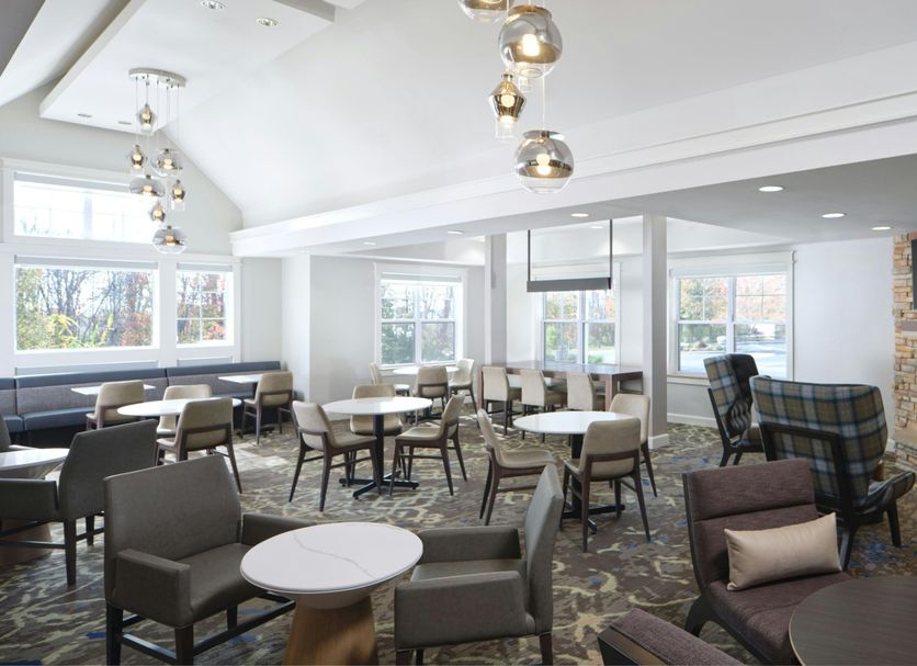 Residence Inn by Marriott Albany East Greenbush/Tech Valley lounge with seating area and fireplace