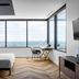Mint House Dallas Downtown By Kasa guest room with city view, large windows, desk and bed in Dallas