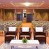 Kuala Lumpur International Hotel meeting room in Kuala Lumpur with rows of chairs and seating area