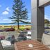 Pavilion Beachfront Apartments in Mount Maunganui with ocean view from balcony seating