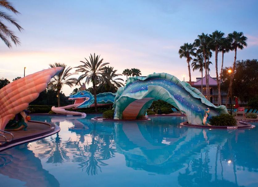 Disney's Port Orleans Resort - French Quarter in Lake Buena Vista, dragon-themed pool at sunset
