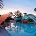 Disney's Port Orleans Resort - French Quarter in Lake Buena Vista, dragon-themed pool at sunset