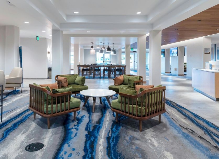 Fairfield Inn & Suites by Marriott Rapid City lobby with seating area and marble-style flooring