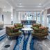 Fairfield Inn & Suites by Marriott Rapid City lobby with seating area and marble-style flooring