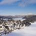 Lake Placid Inn: Residences in Lake Placid with snowy lake and mountain views