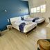 Hotel Amerique in Palavas-les-Flots room with two single beds, window, desk and chairs