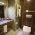Sor Hotel Eskisehir bathroom with sink vanity, mirror, towel rack and wall-mounted toilet in Eskişehir