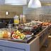 Novotel Campo Grande buffet breakfast station with fruit, juice, pastries and hot dishes in Campo Grande
