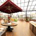 Lotos Inn & Suites, Nairobi rooftop restaurant with buffet, tables, and city views