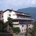 Hotel Glavjc in Torno with hillside lake views and a terrace overlooking the mountains