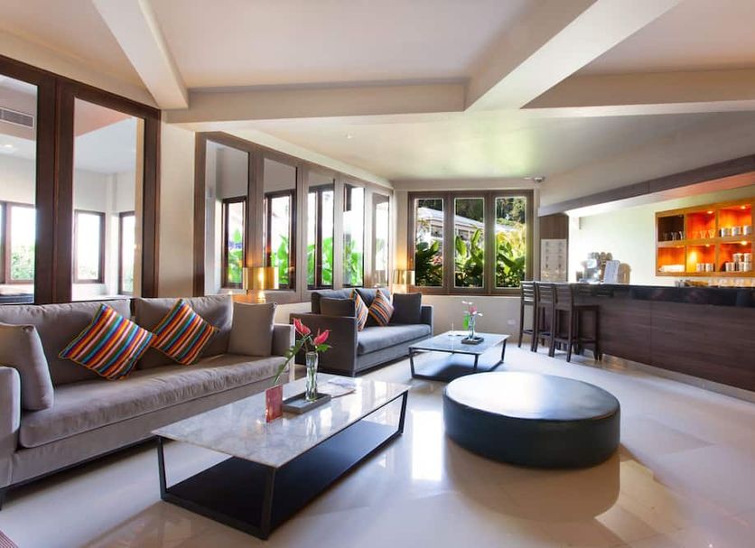 Sentido Khaolak in Khao Lak lobby lounge with sofas, coffee table and bar area