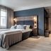 Quality Hotel Waterfront Alesund room with double bed, seating area and wardrobe in Ålesund