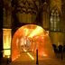 Kruisherenhotel Maastricht entrance with illuminated orange tunnel outside historic stone facade