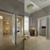 Monument Hotel, Athens: mirrored room with open doors, chair, desk and light wood floors