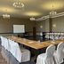 Best Western Bohemian Resort Sevan meeting room with U-shaped tables and white-covered chairs