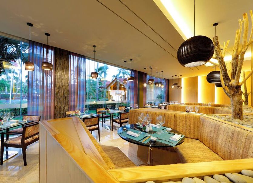 TRS Turquesa by Palladium - Adults Only restaurant with indoor dining and tropical garden views in Punta Cana