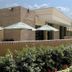 Oakwood Falls Church in Falls Church exterior with patio umbrellas, landscaping, and sidewalk
