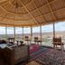 Kasbah Tizzarouine in Boumalne Dadès lounge with panoramic desert-view seating