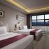 Holiday Inn & Suites Hulunbuir twin room with window city view and desk