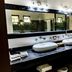 Casa Ticul Hotel By Bfh in Playa del Carmen bathroom with double vessel sinks and large mirror
