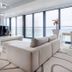 Marine Hotel by Zdrojowa in Kolobrzeg, airy suite with sea-view windows, sofa and TV