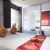 Palette Bangkok Natural Resort and Spa in Bangkok, bedroom with king bed, red accents and glass partition