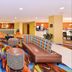 Best Western Plus Fresno Airport Hotel in Fresno lobby lounge with colorful patterned carpet and leather seating