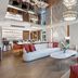 Ela Excellence Resort Belek lobby lounge with curved seating, chandeliers and garden view in Belek