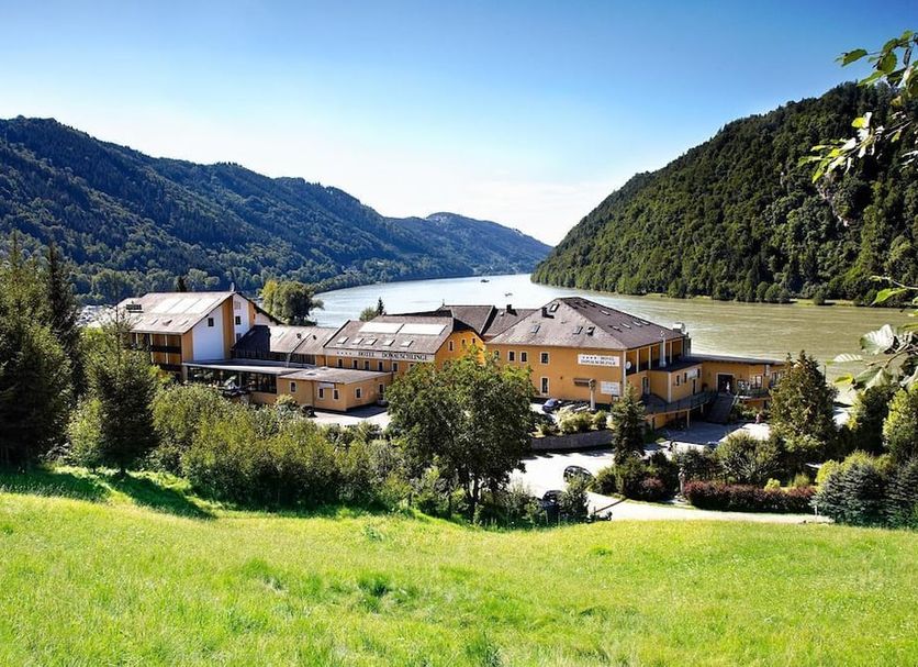 Riverresort Donauschlinge in Haibach ob der Donau with river valley and forested hills