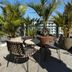 Onomo Hotel Rabat Terminus rooftop terrace with potted palms and seating in Rabat