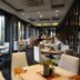 Marine Beach Hotel Pattaya in Jomtien restaurant with floor-to-ceiling windows and dining tables
