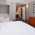 Courtyard by Marriott Charlotte Gastonia guest room with whirlpool tub and king bed in Gastonia