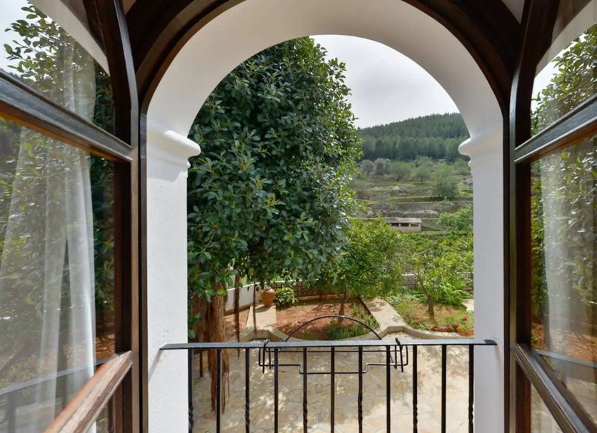 Agroturismo Ca Sa Vilda Marge in Sant Joan de Labritja, balcony view of lush hills and a garden