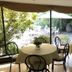 Hotel Acacias De Vitacura Santiago dining area with garden views and outdoor seating