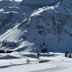 Haus Friedrichsburg in Bad Hofgastein with snowy alpine mountains and a ski slope